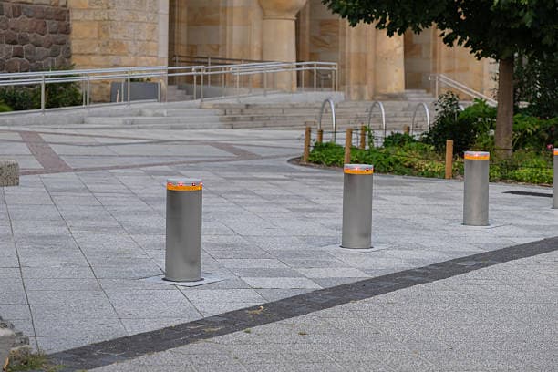 Rising bollards for high-security vehicle access control